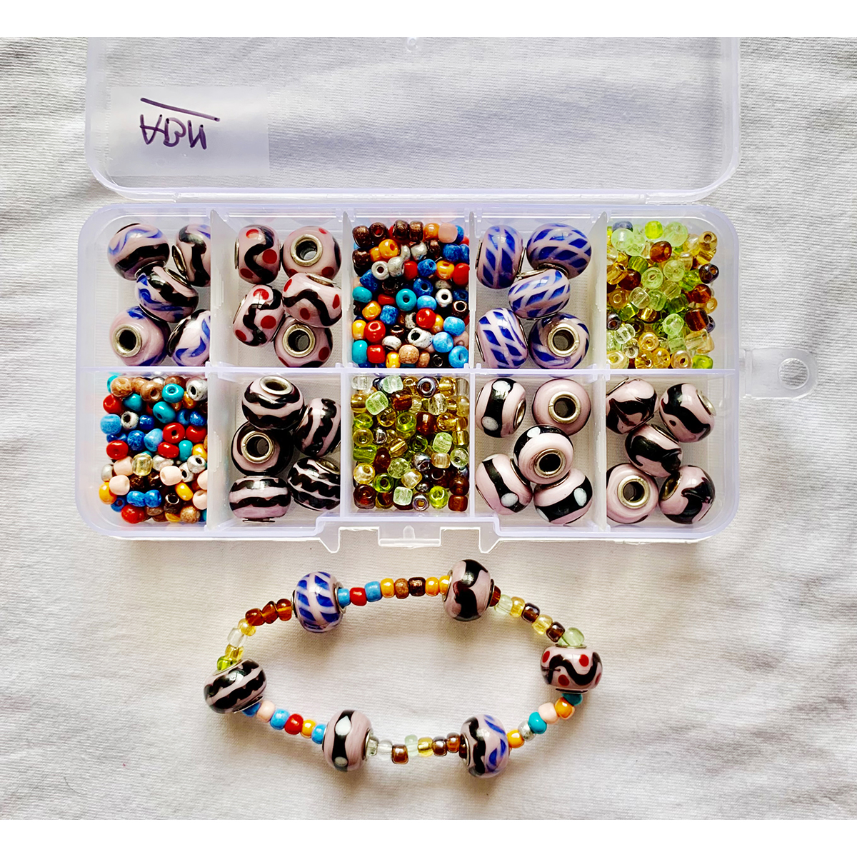 Item "ABN" Lampworked Glass Pandora style Beads, DIY and Jewelry Kit, 10 compartment box.